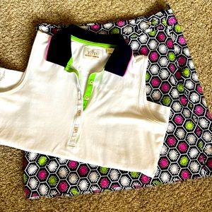 EP pro tour dry golf set. Sleeveless white top and multicolored skirt to match.